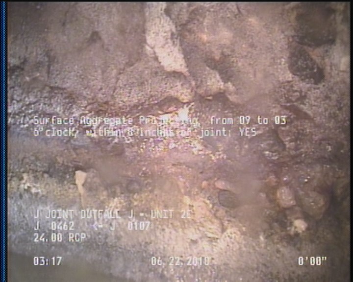 Surface Aggregate Projecting, from 09 to 03 o'clock, within 8 inches of joint: YES