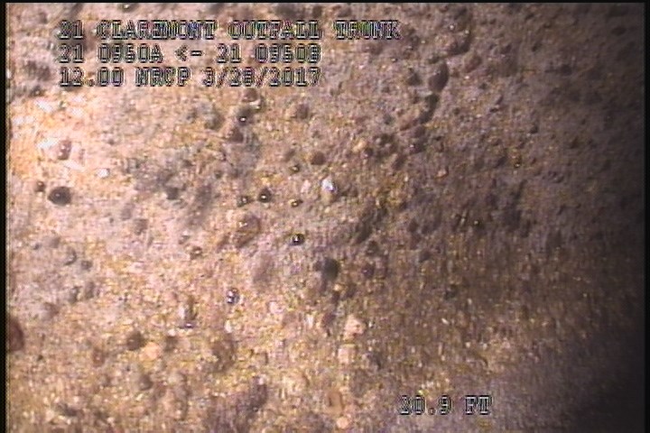 Surface Aggregate Projecting, from 09 to 03 o'clock, within 8 inches of joint: YES - SEVERE AGG
