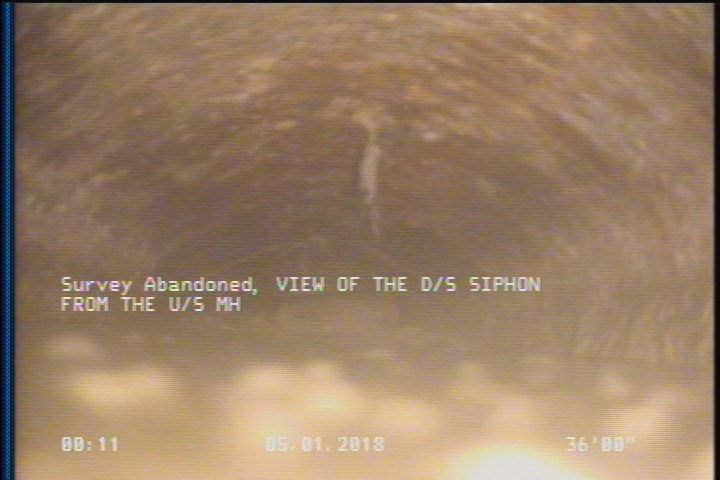 Survey Abandoned - VIEW OF THE D/S SIPHON FROM THE U/S MH