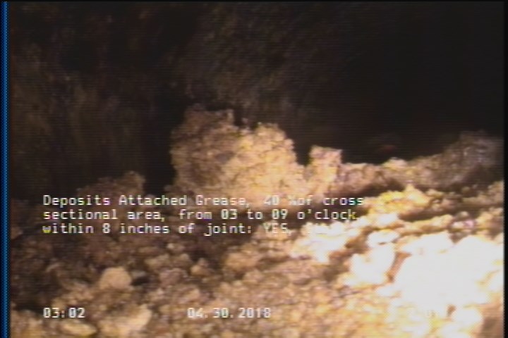 Deposits Attached Grease, 40 %of cross sectional area, from 03 to 09 o'clock, , within 8 inches of joint: YES, Start
