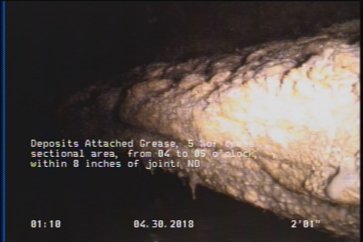 Deposits Attached Grease, 5 %of cross sectional area, from 04 to 05 o'clock, , within 8 inches of joint: NO