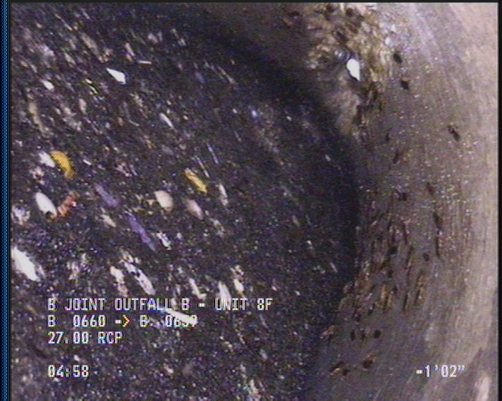 Deposits Settled Other, 100 %of cross sectional area, from 12 to 12 o'clock, , within 8 inches of joint: YES - DEBRIS