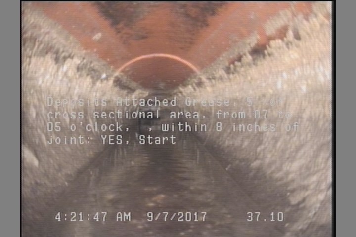 Deposits Attached Grease, 5 %of cross sectional area, from 07 to 05 o'clock, , within 8 inches of joint: YES, Start