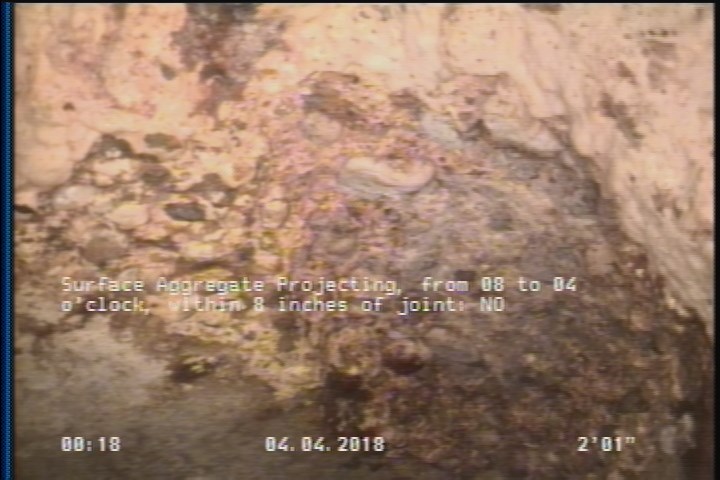 Surface Aggregate Projecting, from 08 to 04 o'clock, within 8 inches of joint: NO