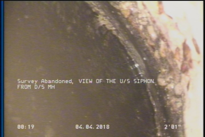 Survey Abandoned - VIEW OF THE U/S SIPHON FROM D/S MH