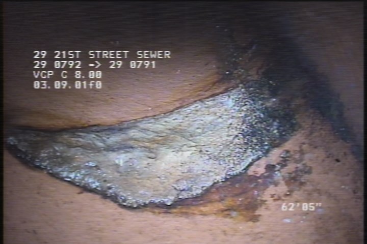 Deposits Attached Encrustation, 5 %of cross sectional area, from 07 to 09 o'clock, , within 8 inches of joint: YES