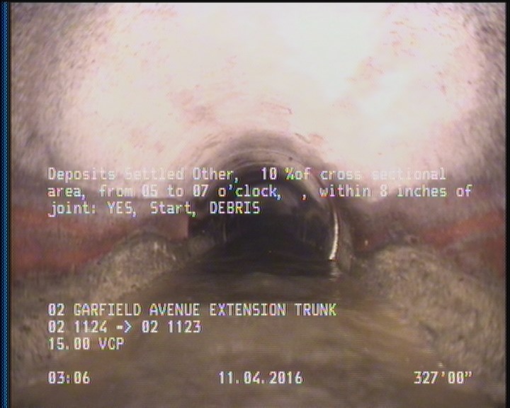 Deposits Settled Other, 10 %of cross sectional area, from 05 to 07 o'clock, , within 8 inches of joint: YES, Start - DEBRIS