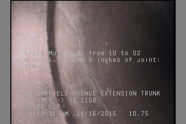 Crack Multiple, from 10 to 02 o'clock, within 8 inches of joint: YES