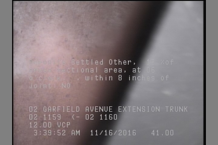 Deposits Settled Other, 15 %of cross sectional area, at 06 o'clock, , within 8 inches of joint: NO
