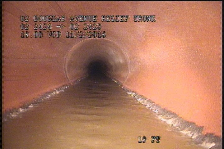 Deposits Attached Grease, 5 %of cross sectional area, from 05 to 07 o'clock, , within 8 inches of joint: YES