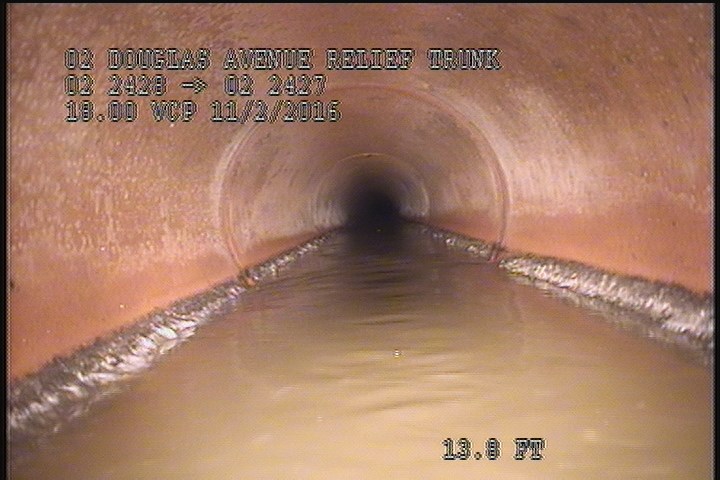 Deposits Attached Grease, 5 %of cross sectional area, from 05 to 07 o'clock, , within 8 inches of joint: YES