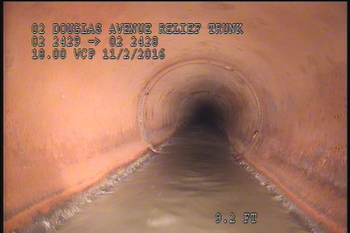 Deposits Attached Grease, 5 %of cross sectional area, from 05 to 07 o'clock, , within 8 inches of joint: YES