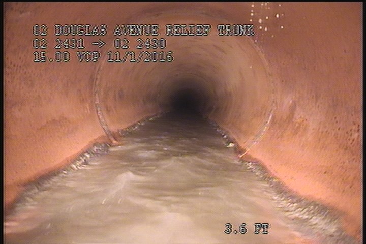 Deposits Attached Grease, 5 %of cross sectional area, from 05 to 07 o'clock, , within 8 inches of joint: YES