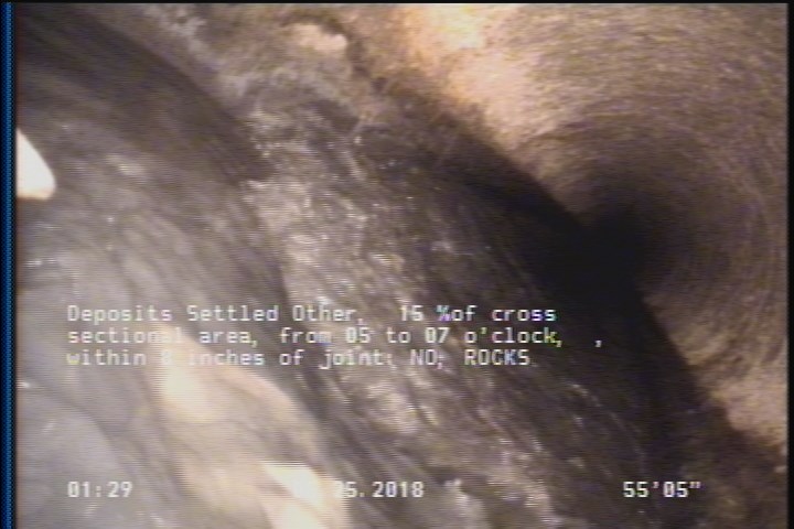 Deposits Settled Other, 15 %of cross sectional area, from 05 to 07 o'clock, , within 8 inches of joint: NO - ROCKS