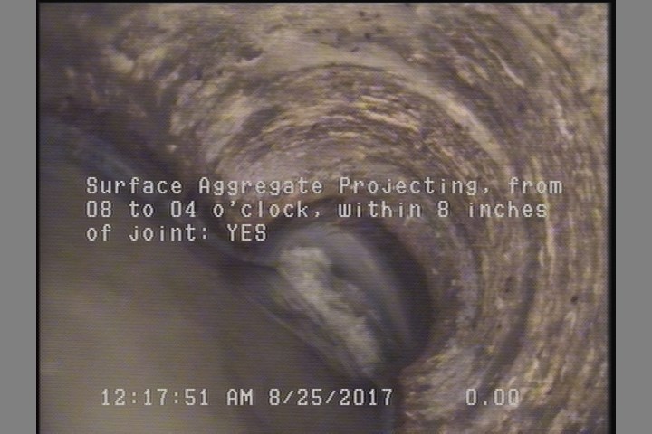 Surface Aggregate Projecting, from 08 to 04 o'clock, within 8 inches of joint: YES