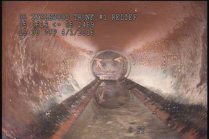 Downstream Manhole, Survey Begins - 11:54 AM