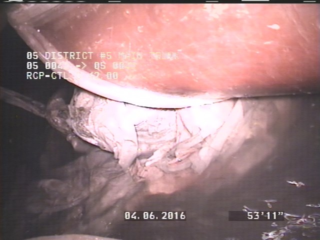 Deposits Settled Other, 10 %of cross sectional area, from 05 to 07 o'clock, , within 8 inches of joint: NO - PAPER-RAGS