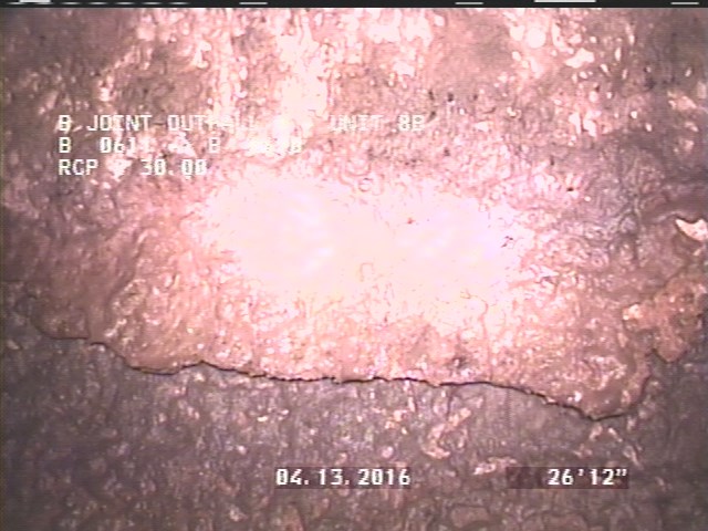 Surface Spalling, from 02 to 04 o'clock, within 8 inches of joint: NO - PEELING LAITANCE COAT