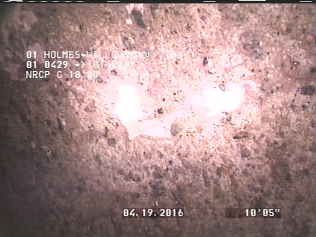 Surface Aggregate Projecting, from 08 to 04 o'clock, within 8 inches of joint: NO - SEVERE AGG