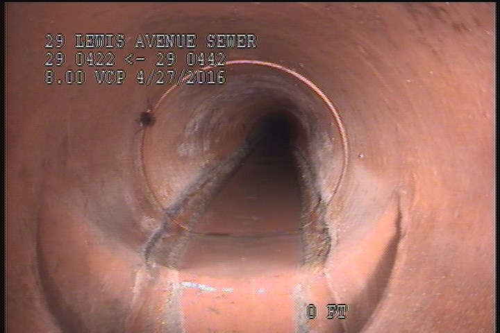 Downstream Manhole, Survey Begins - 9:44 AM