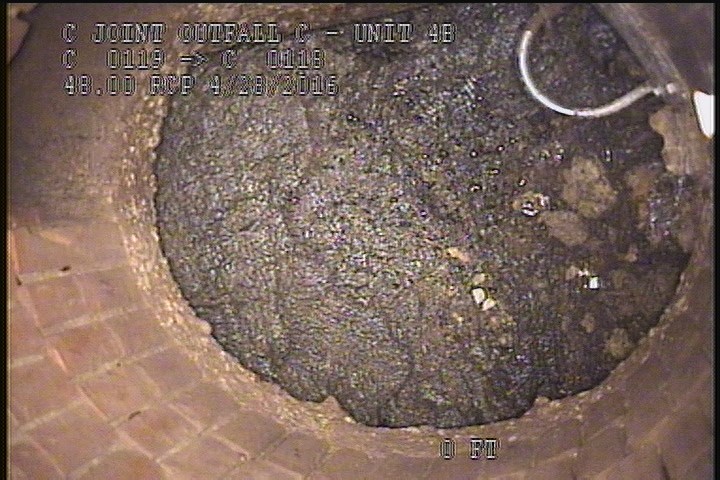 General Observation - FLOATING SLUDGE MH#C118