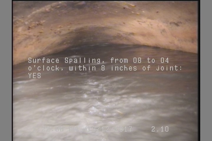 Surface Spalling, from 08 to 04 o'clock, within 8 inches of joint: YES