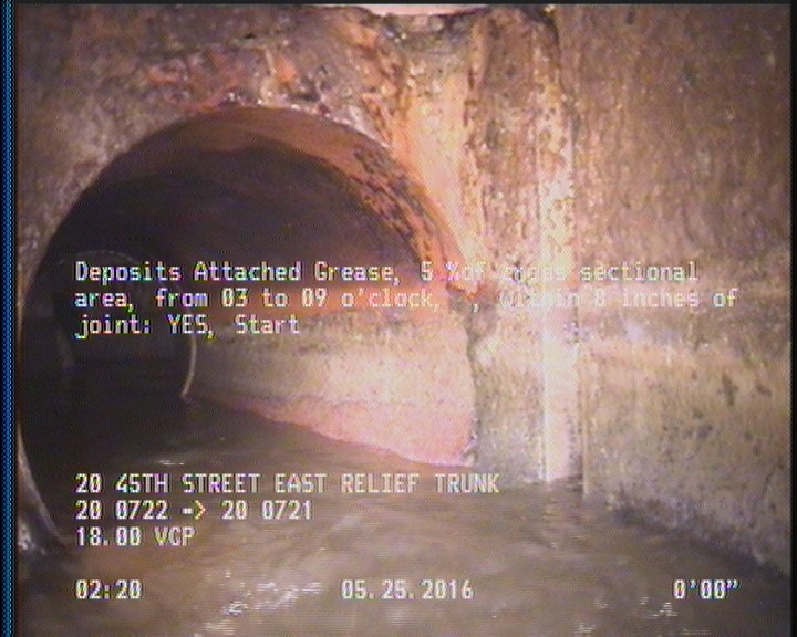 Deposits Attached Grease, 5 %of cross sectional area, from 03 to 09 o'clock, , within 8 inches of joint: YES