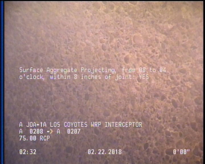 Surface Aggregate Projecting, from 08 to 04 o'clock, within 8 inches of joint: YES