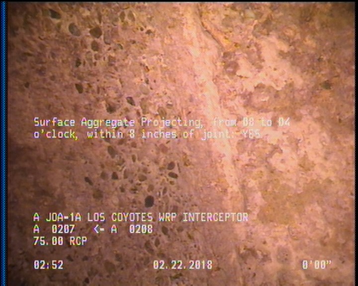 Surface Aggregate Projecting, from 08 to 04 o'clock, within 8 inches of joint: YES