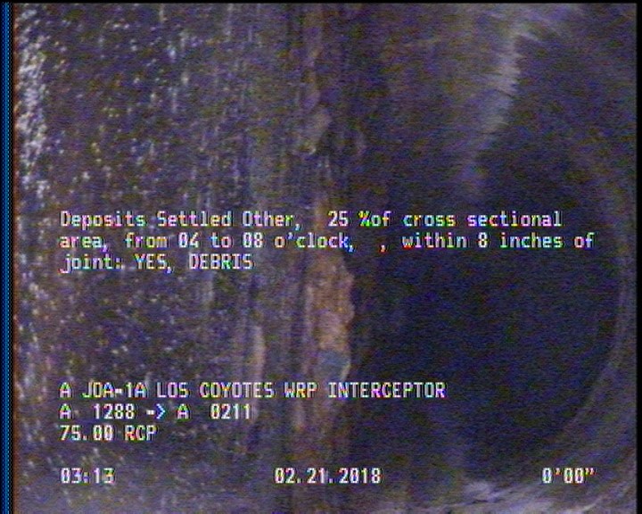 Deposits Settled Other, 25 %of cross sectional area, from 04 to 08 o'clock, , within 8 inches of joint: YES - DEBRIS
