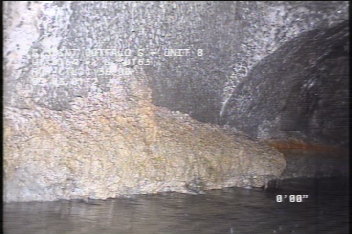 Deposits Attached Grease, 15 %of cross sectional area, from 07 to 09 o'clock, , within 8 inches of joint: NO - INSIDE MH
