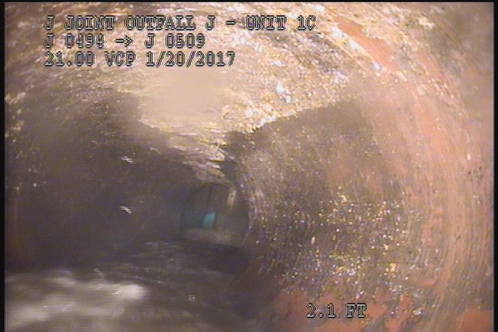 Deposits Attached Encrustation, 5 %of cross sectional area, from 09 to 03 o'clock, , within 8 inches of joint: YES