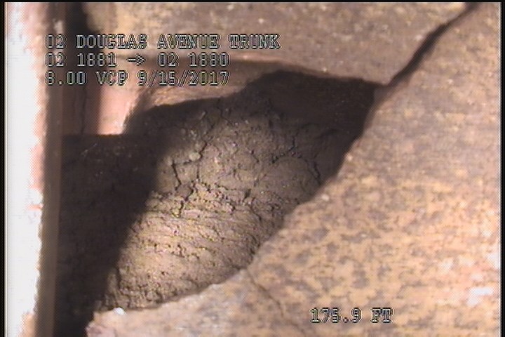 General Photograph - VOID BEHIND BROKEN PIPE