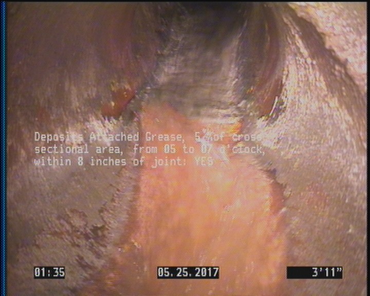 Deposits Attached Grease, 5 %of cross sectional area, from 05 to 07 o'clock, , within 8 inches of joint: YES