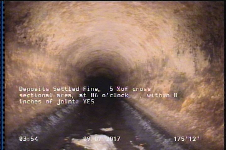 Deposits Settled Fine, 5 %of cross sectional area, at 06 o'clock, , within 8 inches of joint: YES