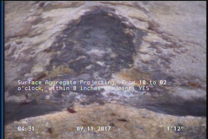 Surface Aggregate Projecting, from 10 to 02 o'clock, within 8 inches of joint: YES