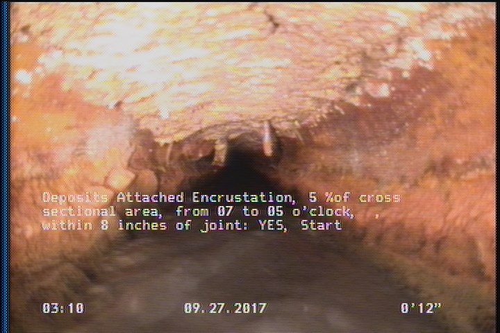 Deposits Attached Encrustation, 5 %of cross sectional area, from 07 to 05 o'clock, , within 8 inches of joint: YES, Start