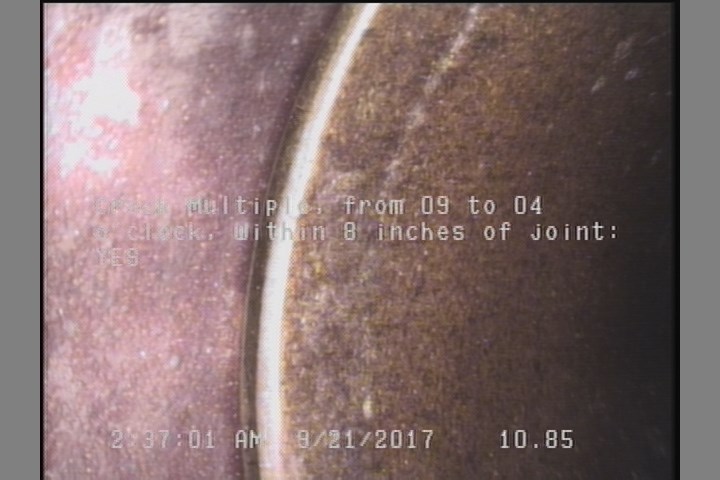 Crack Multiple, from 09 to 04 o'clock, within 8 inches of joint: YES