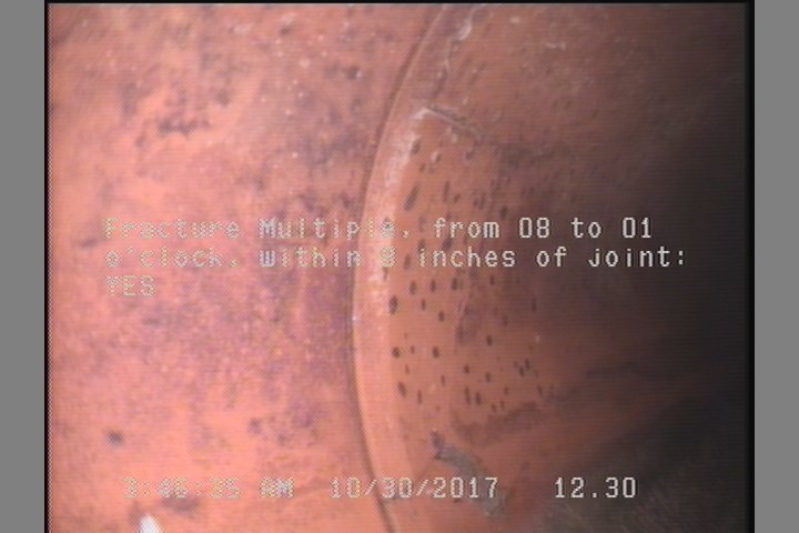 Fracture Multiple, from 08 to 01 o'clock, within 8 inches of joint: YES