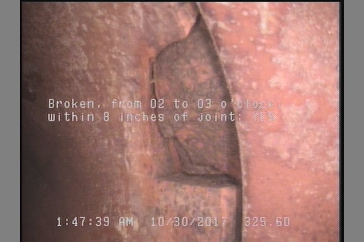 Broken, from 02 to 03 o'clock, within 8 inches of joint: YES - POSSIBLE REPAIR IS VISIBLE
