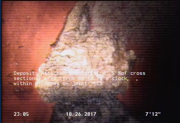 Deposits Attached Encrustation, 5 %of cross sectional area, from 09 to 10 o'clock, , within 8 inches of joint: YES