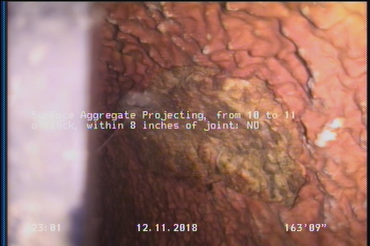 Surface Aggregate Projecting, from 10 to 11 o'clock, within 8 inches of joint: NO