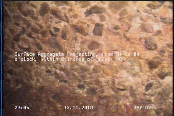 Surface Aggregate Projecting, from 01 to 04 o'clock, within 8 inches of joint: NO