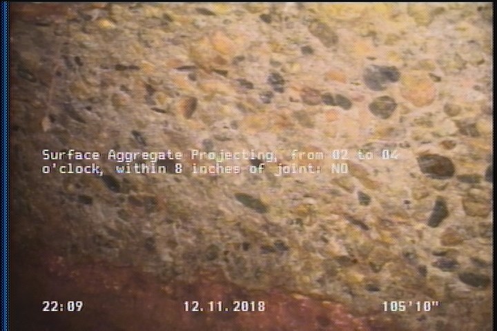 Surface Aggregate Projecting, from 02 to 04 o'clock, within 8 inches of joint: NO