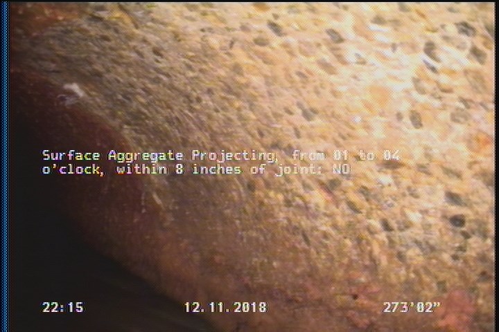 Surface Aggregate Projecting, from 01 to 04 o'clock, within 8 inches of joint: NO