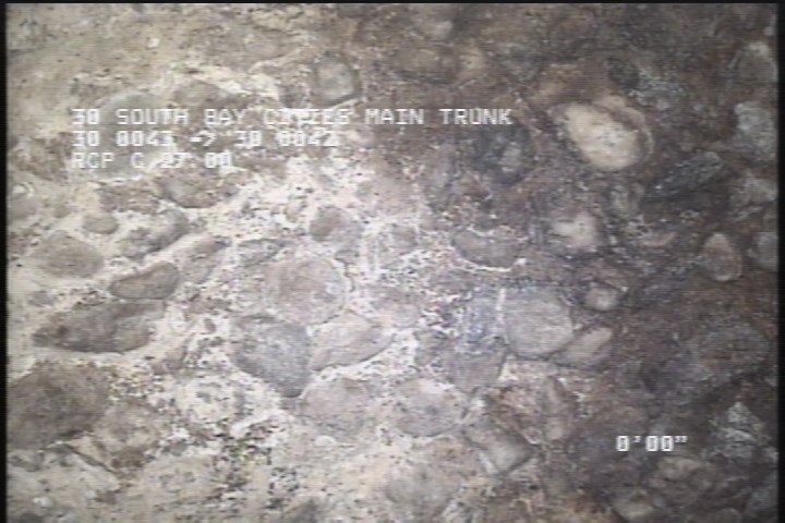 Surface Aggregate Projecting, from 08 to 04 o'clock, within 8 inches of joint: YES, Start - SEVERE AGG UNDER MAG COAT