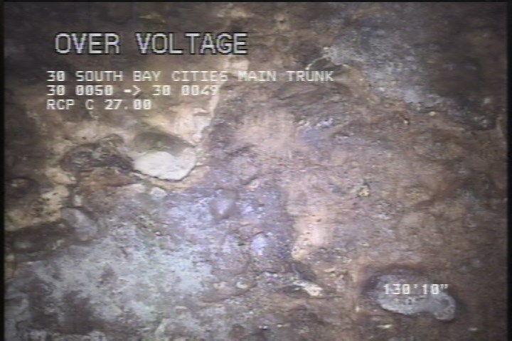 Surface Spalling, from 08 to 04 o'clock, within 8 inches of joint: NO - BLISTERING PEELING CONCRETE UNDER MAG COAT