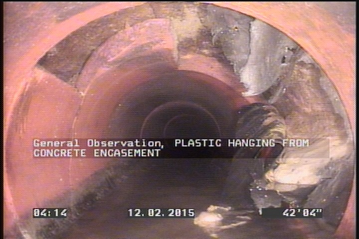 General Observation - PLASTIC HANGING FROM CONCRETE ENCASEMENT