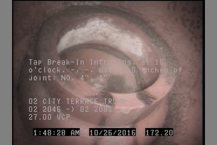 Tap Break-In Intruding, at 10 o'clock, -, -, within 8 inches of joint: NO, 4", 1"