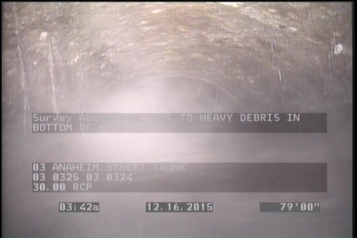 Survey Abandoned - DUE TO HEAVY DEBRIS IN BOTTOM OF PIPE